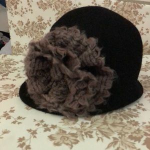 Adorable wool hat with large floral knit detail